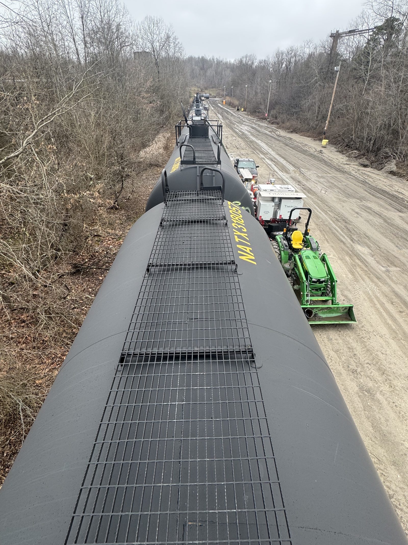 Rail spur running the length of an active loading facility